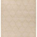 Gray handknotted rug with a geometric diamond pattern in cream and tan, featuring fringe on both ends
