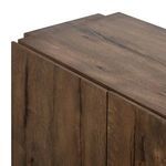 Detail of Perrin Sideboard door edge with subtle bevels and wood texture
