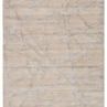Modern hand-tufted abstract rug with intersecting silver gray lines over a soft white-gray viscose and wool blend