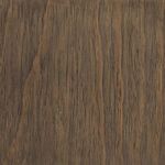 Close-up of wood grain texture on tabletop showing natural pine wood pattern