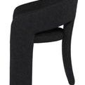 Side profile of Anise Dining Chair highlighting curved backrest and leg structure