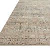 Close-up angled view showing low pile texture and edge of Axel Stone Sky Rug
