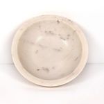 Top-down view showing smooth interior and natural marble pattern in the bowl