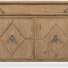 Front view of closed hall chest highlighting diamond motif on door panels