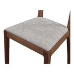 Leone Dining Chair close-up on seat cushion texture showing light grey woven fabric detail