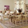 Finn Dining Table styled in a bright dining room with mixed seating and table set for meal