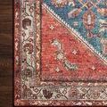 Close-up of the bottom left corner of Layla Marine / Clay Rug highlighting color and border pattern
