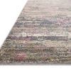 Side angle showing low pile height and detailed edge stitching on the Arden Berry multi rug sample