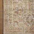 Crisp corner view of the rug illustrating fringe detail and subtle decorative motifs in warm ivory tones