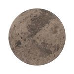 Top-down view of round light grey marble tabletop with natural veining and patterning