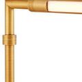 Close-up showing vertical lamp arm and its swivel joint in brushed brass finish