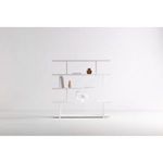 Miri Large Shelf styled minimally in an empty white room with a few decorative objects on shelves