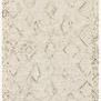 Leela Ivory/Lagoon modern rug with abstract geometric diamond shapes and a textured wool pile