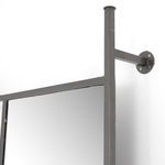 Wall bracket detail in gunmetal showing mounting screws and rectangular frame corner