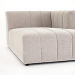Close-up of thick cushioned sandstone fabric seat with prominent vertical channels
