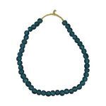 Darker blue vintage sea glass beads arranged in a larger round loop with natural fiber cord knotted at top