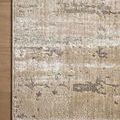 Close-up of Wyatt Natural Ivory Rug corner highlighting soft texture on wood flooring