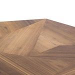 Top angled detail of Brooklyn Dining Table highlighting the geometric wood pattern and polished surface