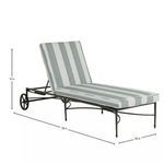 Underframe detail with circular and curved aluminum supports and gold accent fastener on white fabric