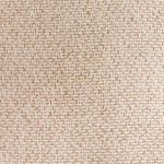 Extreme close-up of textured neutral Jacquard pattern showing woven fiber detail