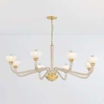 St. Lawrence chandelier hanging from ceiling in room with white walls, side-angle view showing open arms