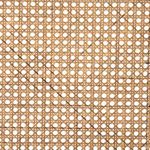 Close-up of open woven cane detailing on Flora Dining Chair's backrest