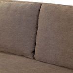 Close-up of two back cushions meeting seam and upholstery texture