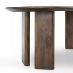 Lower side view capturing the thickness and curvature of sturdy mango wood legs