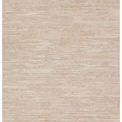 Hand-knotted rug laid flat showcasing overall rectangular shape and consistent cream beige color
