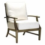 Outdoor lounge chair in aluminum mahogany frame with off-white cushions, slightly different lighting