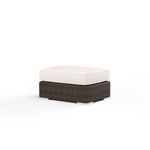 Montecito outdoor ottoman with Cognac multi-colored resin wicker base and thick off-white cushion