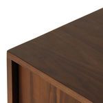 Close-up corner edge showcasing walnut veneer's polished surface and clean lines