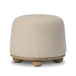 Bilbury Ottoman angled front side view showing soft rounded form and oak bun feet
