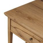 Oak tabletop corner detail showing rounded edge and wood texture