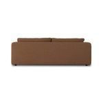 Back corner view showing smooth linen upholstery wrapping sofa frame