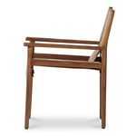 Side profile of Remy Dining Chair showing slim wooden frame and leather sling seat.