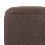 Close-up side view highlighting tailored piping detail along the top edge of upholstery