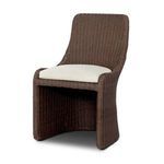 Three-quarter view showing curved backrest and side frame of Blaire Outdoor Dining Chair