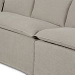 Detail of back cushions and seat base displaying fine linen fabric and stitching