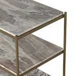 Close-up showing corner of nightstand with marble shelves and antique brass iron edging