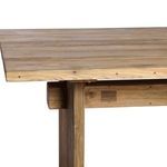 Close-up end angle showing thickness of elm planks and beam stretcher joining plank legs