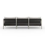 Rear view showing rope weaving in black contrasting with stone grey teak frame on sofa back