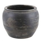 Large black pottery water jar with weathered texture and rounded shape shown from side on white background