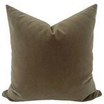 Olive green velvet pillow cover with a soft, smooth texture and a slightly pointed top corner
