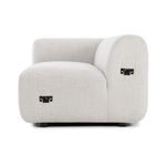 Front perspective of right arm chaise segment highlighting rounded edges and black connector brackets