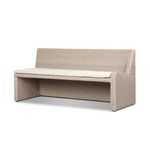 Angled view of vintage white rattan dining banquette showing side panel and seat cushion