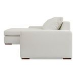 Side profile view of Thomas sectional focusing on the low armrest and cushion depth