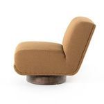 Side view of Bronwyn chair angled to show cushioning and circular parawood swivel base