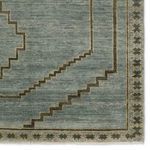 Close-up of stepped rectangular pattern and star border, highlighting Woven texture