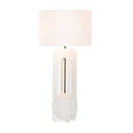 Jae Table Lamp lit to show warm light through linen shade